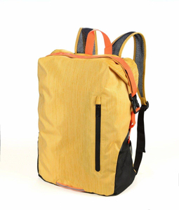 foldable backpack of the roll top type TROIKA trekpack - yellow.