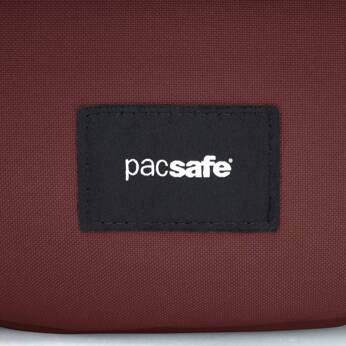 Folding women's anti-theft bag Pacsafe Go - burgundy