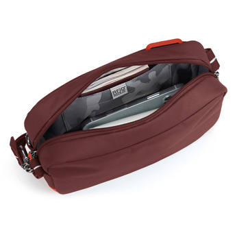 Small urban anti-theft bag Pacsafe Go - burgundy.