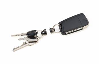 magnetic keychain TROIKA plus & minus - black.