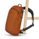 Anti-theft backpack for one shoulder Pacsafe ECO 12L - orange made of econyl.