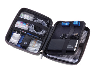 rigid travel organizer TROIKA for cables and chargers.