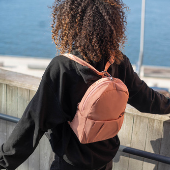 Pacsafe CX 2-in-1 Anti-Diebstahl-Rucksack/Tasche - rosa