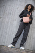 The foldable women's anti-theft handbag Pacsafe Citysafe CX Econyl® - pink.