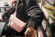 The foldable women's anti-theft handbag Pacsafe Citysafe CX Econyl® - pink.